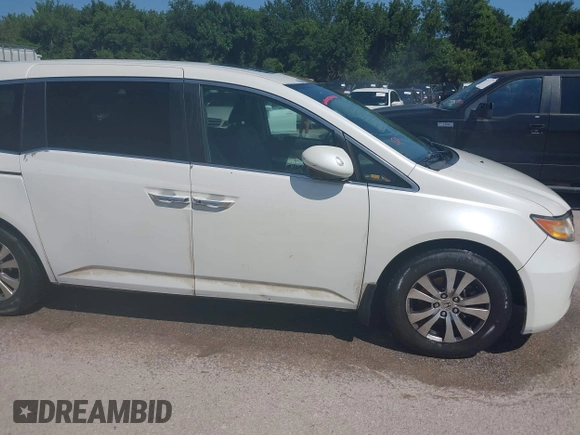 2014 Honda Odyssey EX-L z VIN 5FNRL5H61EB001509, wystawiony jako IAAI lot #42371539 z przebiegiem 259 195 mil mil oraz . Historia ofert i sprzedaży dostępna na DreamBid. Obrazek 13.