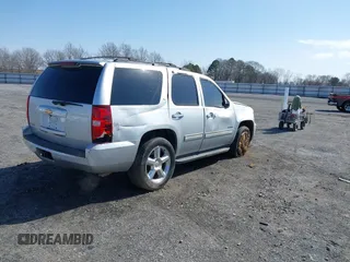 2013 Chevrolet Tahoe LT z VIN 1GNSCBE06DR106384, wystawiony jako IAAI lot #41574274 z przebiegiem 168 655 mil mil oraz . Historia ofert i sprzedaży dostępna na DreamBid. Obrazek 4.