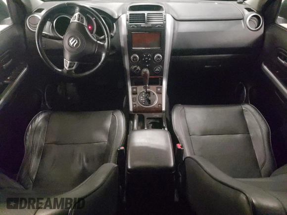 2007 Suzuki Grand Vitara Luxury z VIN JS3TD947774200407, wystawiony jako Copart lot #52001965 z przebiegiem Nie podano mil oraz Szkoda całkowita • Salvage title. Historia ofert i sprzedaży dostępna na DreamBid. Obrazek 8.