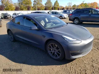 2020 Tesla Model 3 Long Range with VIN 5YJ3E1EBXLF662897, listed as a Copart auction lot 75873144 with 106,270 mi miles and Salvage Title. Bid and sale history available at carsss.com. Image 4.