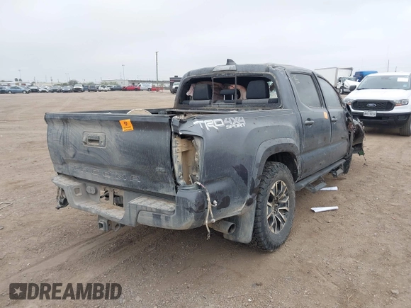 2023 Toyota Tacoma 4WD SR with VIN 3TMCZ5AN6PM554838, listed as a IAAI auction lot 41215603 with 1 mi miles. Bid and sale history available at carsss.com. Image 4.
