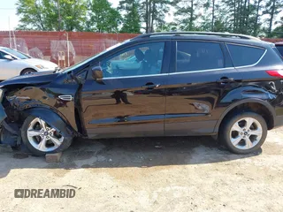 2013 Ford Escape SE with VIN 1FMCU0GX5DUD04780, listed as a IAAI auction lot 41990300 with 91,193 mi miles and . Bid and sale history available at DreamBid. Image 14.