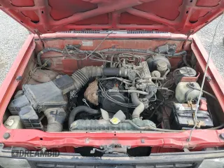 1991 Mitsubishi Mighty Max z VIN JA7FL24W2MP026041, wystawiony jako Copart lot #79159244 z przebiegiem 219 903 mil mil oraz Szkody całkowita. Historia ofert i sprzedaży dostępna na DreamBid. Obrazek 11.