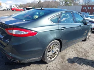 2015 Ford Fusion SE with VIN 3FA6P0H92FR100897, listed as a IAAI auction lot 41870271 with 195,182 mi miles and . Bid and sale history available at DreamBid. Image 4.