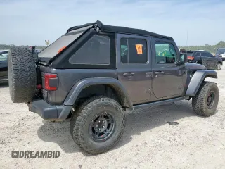 2018 Jeep Wrangler Unlimited Rubicon with VIN 1C4HJXFG6JW166731, listed as a Copart auction lot 56997385 with 117,713 mi miles and Salvage title. Bid and sale history available at DreamBid. Image 3.