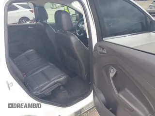 2016 Ford Escape Titanium z VIN 1FMCU9J90GUC76504, wystawiony jako IAAI lot #42552851 z przebiegiem 89 570 mil mil oraz . Historia ofert i sprzedaży dostępna na DreamBid. Obrazek 8.