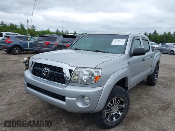 2011 Toyota Tacoma with VIN 3TMLU4EN4BM069898, listed as a IAAI auction lot 42371500 with 201,538 mi miles and . Bid and sale history available at DreamBid. Image 2.