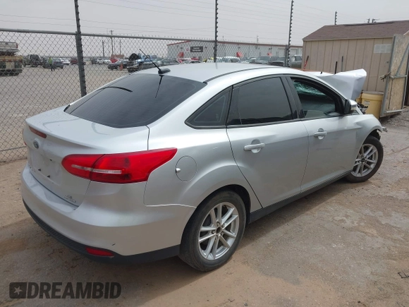 2016 Ford Focus SE with VIN 1FADP3F20GL338536, listed as a IAAI auction lot 41812805 with 130,943 mi miles. Bid and sale history available at carsss.com. Image 4.