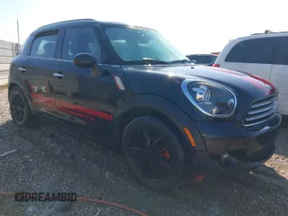 2012 MINI Countryman with VIN WMWZB3C58CWM30013, listed as a IAAI auction lot 41982899 with 147,431 mi miles and . Bid and sale history available at DreamBid. Image 1.