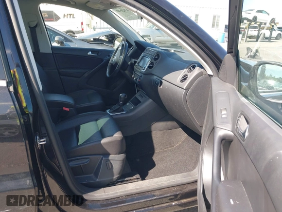 2015 Volkswagen Tiguan SE with VIN WVGAV7AX5FW509612, listed as a IAAI auction lot 42020599 with 64,201 mi miles and . Bid and sale history available at DreamBid. Image 5.