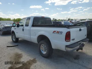 2004 Ford F-250 XL with VIN 1FTNX21P04EA92082, listed as a Copart auction lot 55311935 with 217,363 mi miles and Salvage title. Bid and sale history available at DreamBid. Image 2.