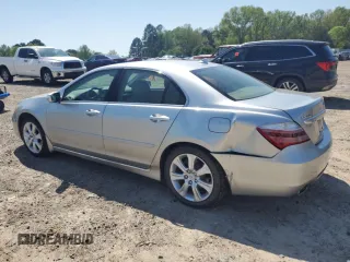 2010 Acura RL Technology with VIN JH4KB2F61AC001845, listed as a Copart auction lot 52549445 with 150,435 mi miles and Salvage Title. Bid and sale history available at DreamBid. Image 2.