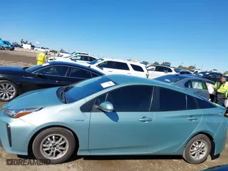 2022 Toyota Prius L Eco with VIN JTDKAMFU3N3187053, listed as a IAAI auction lot 41741417 with 152,444 mi miles. Bid and sale history available at carsss.com. Image 15.