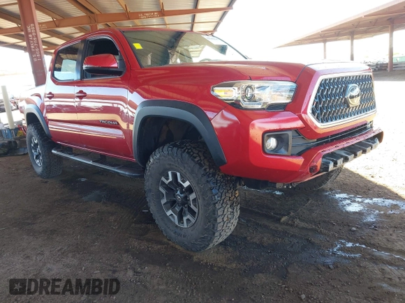 2018 Toyota Tacoma SR with VIN 3TMCZ5AN8JM141486, listed as a IAAI auction lot 42142145 with 54,851 mi miles and . Bid and sale history available at DreamBid. Image 1.