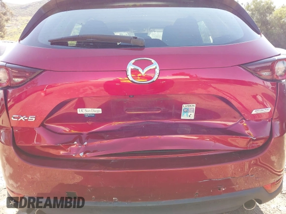2019 Mazda CX-5 Sport with VIN JM3KFABM0K1633065, listed as a IAAI auction lot 41968786 with 90,407 mi miles and . Bid and sale history available at DreamBid. Image 6.