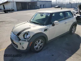 2012 MINI Hardtop with VIN WMWSU3C59CT542610, listed as a Copart auction lot 56720805 with 106,187 mi miles and Salvage Title. Bid and sale history available at DreamBid. Image 1.