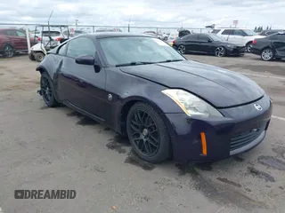 2005 Nissan 350Z Enthusiast z VIN JN1AZ34D25M605438, wystawiony jako IAAI lot #42131179 z przebiegiem 143 157 mil mil oraz . Historia ofert i sprzedaży dostępna na DreamBid. Obrazek 1.