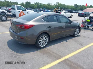 2017 Mazda 3 Touring with VIN 3MZBN1V74HM142735, listed as a IAAI auction lot 42395462 with 137,543 mi miles and . Bid and sale history available at DreamBid. Image 4.