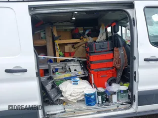 2021 Ford Transit Cargo z VIN 1FTYE1Y86MKA71783, wystawiony jako IAAI lot #42183454 z przebiegiem 53 405 mil mil oraz . Historia ofert i sprzedaży dostępna na DreamBid. Obrazek 8.