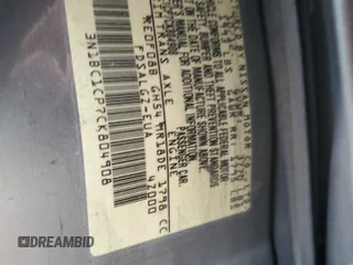 2012 Nissan Versa S z VIN 3N1BC1CP7CK804908, wystawiony jako Copart lot #50789765 z przebiegiem 125 322 mil mil oraz Szkody całkowita. Historia ofert i sprzedaży dostępna na DreamBid. Obrazek 14.