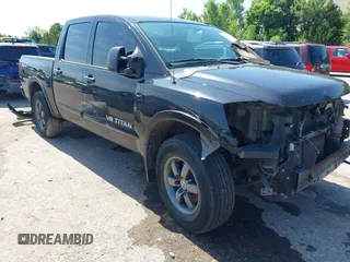 2014 Nissan Titan Pro-4X with VIN 1N6BA0EC9EN502540, listed as a IAAI auction lot 42558083 with Not provided miles and . Bid and sale history available at DreamBid. Image 1.
