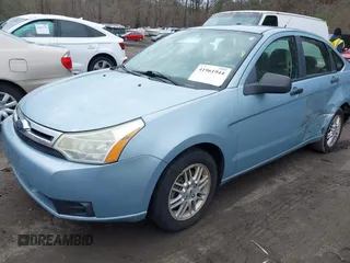 2009 Ford Focus SE with VIN 1FAHP35N79W234138, listed as a IAAI auction lot 41961944 with 189,428 mi miles. Bid and sale history available at carsss.com. Image 2.