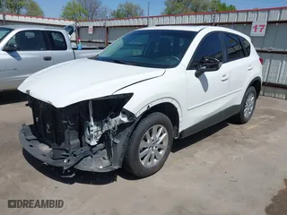 2014 Mazda CX-5 Touring with VIN JM3KE2CY2E0426164, listed as a IAAI auction lot 41812932 with 186,015 mi miles. Bid and sale history available at carsss.com. Image 20.