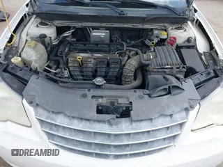 2008 Chrysler Sebring LX with VIN 1C3LC46K78N211784, listed as a IAAI auction lot 41966093 with 147,753 mi miles and . Bid and sale history available at DreamBid. Image 10.