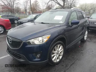2014 Mazda CX-5 Grand Touring with VIN JM3KE4DY8E0366644, listed as a IAAI auction lot 41971438 with 135,644 mi miles and . Bid and sale history available at carsss.com. Image 17.