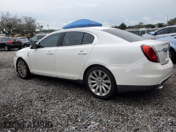 2011 Lincoln MKS z VIN 1LNHL9DRXBG609478, wystawiony jako Copart lot #57226135 z przebiegiem 178 372 mil mil oraz Szkoda całkowita • Salvage title. Historia ofert i sprzedaży dostępna na DreamBid. Obrazek 2.