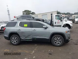 2023 GMC Acadia SLT with VIN 1GKKNML48PZ156202, listed as a IAAI auction lot 41526629 with 29,460 mi miles and . Bid and sale history available at DreamBid. Image 13.