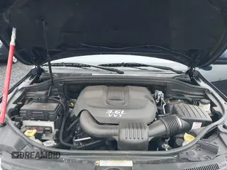 2012 Jeep Grand Cherokee Laredo with VIN 1C4RJFAG9CC220145, listed as a IAAI auction lot 41798457 with 130,603 mi miles. Bid and sale history available at carsss.com. Image 10.