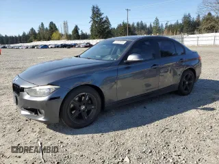 2013 BMW 3 Series 328i xDrive with VIN WBA3B3C56DF530814, listed as a Copart auction lot 52820915 with 144,164 mi miles and Salvage Title. Bid and sale history available at carsss.com. Image 1.