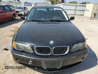 2005 BMW 3 Series 330xi with VIN WBAEW53455PN39175, listed as a Copart auction lot 75733054 with 165,015 mi miles and Salvage Title. Bid and sale history available at DreamBid. Image 5.