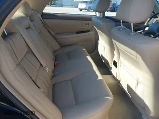 2000 Lexus ES 300 with VIN JT8BF28G2Y5093962, listed as a IAAI auction lot 41634264 with 106,951 mi miles. Bid and sale history available at carsss.com. Image 8.