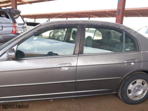 2004 Honda Civic Hybrid with VIN JHMES95654S018200, listed as a IAAI auction lot 41912912 with 291,301 mi miles. Bid and sale history available at carsss.com. Image 14.