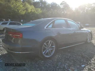 2015 Audi A8 with VIN WAUJGAFD3FN013026, listed as a Copart auction lot 67650374 with 88,064 mi miles and Salvage title. Bid and sale history available at DreamBid. Image 3.