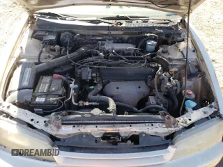 1994 Honda Accord LX with VIN 1HGCD5631RA137411, listed as a Copart auction lot 76126484 with 212,681 mi miles and Salvage Title. Bid and sale history available at carsss.com. Image 11.