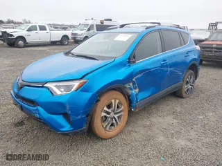 2018 Toyota RAV4 LE with VIN JTMBFREVXJJ739954, listed as a IAAI auction lot 41739873 with 13,726 mi miles. Bid and sale history available at carsss.com. Image 2.