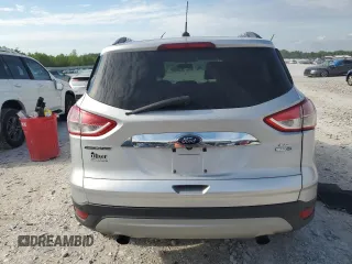 2014 Ford Escape SE with VIN 1FMCU9G97EUE10882, listed as a Copart auction lot 58770725 with 128,167 mi miles and Clean title. Bid and sale history available at DreamBid. Image 6.