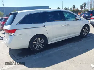 2015 Honda Odyssey Touring Elite with VIN 5FNRL5H91FB038099, listed as a IAAI auction lot 41829649 with 167,017 mi miles and . Bid and sale history available at DreamBid. Image 4.
