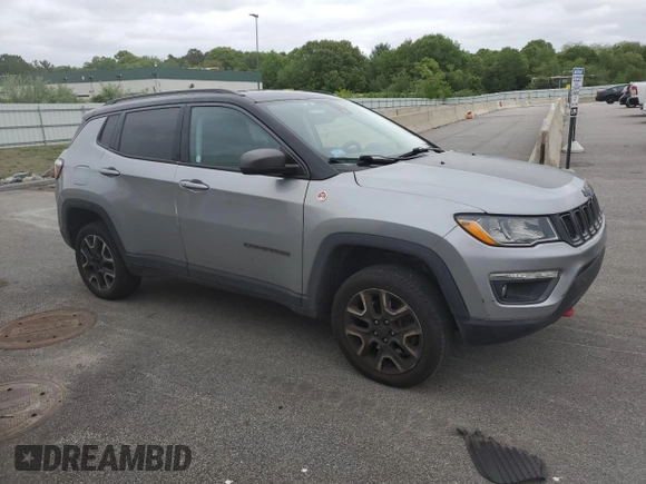 2021 Jeep Compass Trailhawk z VIN 3C4NJDDBXMT565063, wystawiony jako Copart lot #57620595 z przebiegiem 125 956 mil mil oraz Czysty tytuł • Clean title. Historia ofert i sprzedaży dostępna na DreamBid. Obrazek 4.