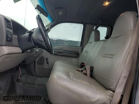 2000 Ford F-250 XL with VIN 1FTNX21F3YED35736, listed as a Copart auction lot 50309805 with 303,811 mi miles and Salvage title. Bid and sale history available at DreamBid. Image 7.