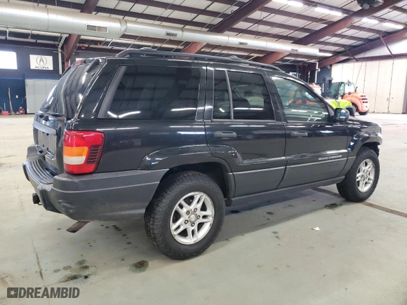 2003 Jeep Grand Cherokee Laredo with VIN 1J4GW48S23C613471, listed as a Copart auction lot 49521865 with 189,918 mi miles and Salvage Title. Bid and sale history available at carsss.com. Image 3.