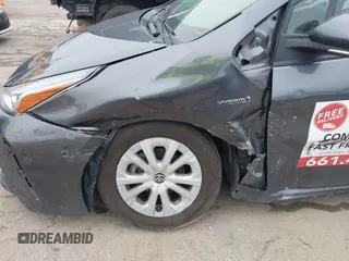 2022 Toyota Prius L Eco with VIN JTDKAMFU3N3190079, listed as a IAAI auction lot 41771356 with 52,607 mi miles and . Bid and sale history available at DreamBid. Image 6.
