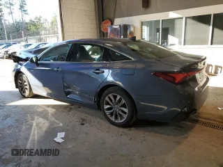 2020 Toyota Avalon Hybrid XLE z VIN 4T1A21FB7LU014807, wystawiony jako Copart lot #38368943 z przebiegiem 40 015 mil mil oraz . Historia ofert i sprzedaży dostępna na DreamBid. Obrazek 2.