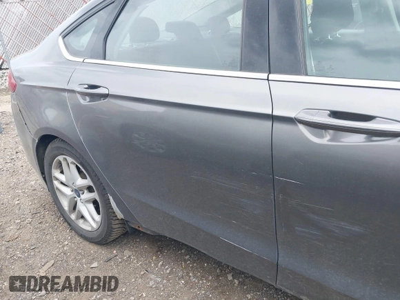2014 Ford Fusion SE with VIN 3FA6P0H79ER222573, listed as a IAAI auction lot 42129165 with 144,181 mi miles and . Bid and sale history available at DreamBid. Image 18.