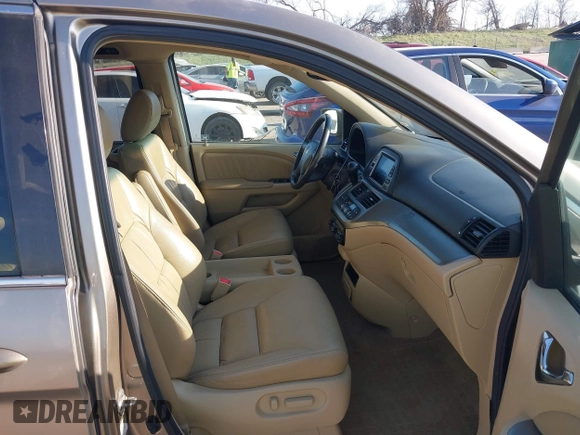 2010 Honda Odyssey EX-L with VIN 5FNRL3H79AB048049, listed as a IAAI auction lot 42055090 with 142,736 mi miles. Bid and sale history available at carsss.com. Image 5.