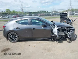 2023 Mazda 3 S Select with VIN JM1BPAKM3P1615785, listed as a IAAI auction lot 42064302 with 63,928 mi miles and . Bid and sale history available at DreamBid. Image 13.