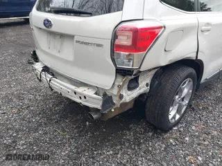 2018 Subaru Forester Touring with VIN JF2SJAWC7JH472147, listed as a IAAI auction lot 41723135 with 63,824 mi miles. Bid and sale history available at carsss.com. Image 6.
